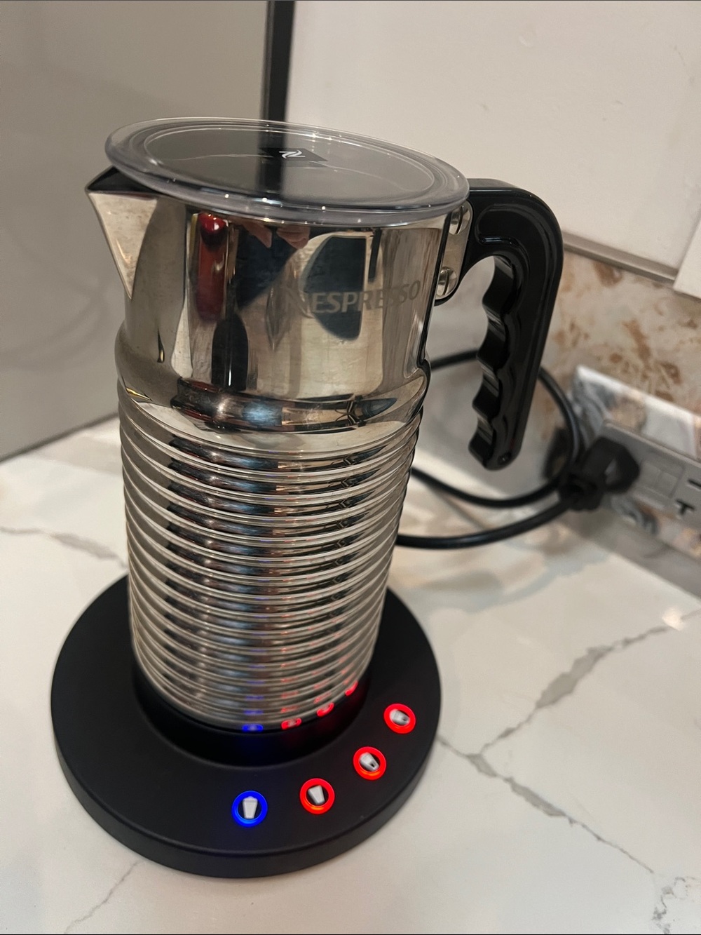 Nespresso Aeroccino 4 Milk Frother, a stainless steel electric milk frother